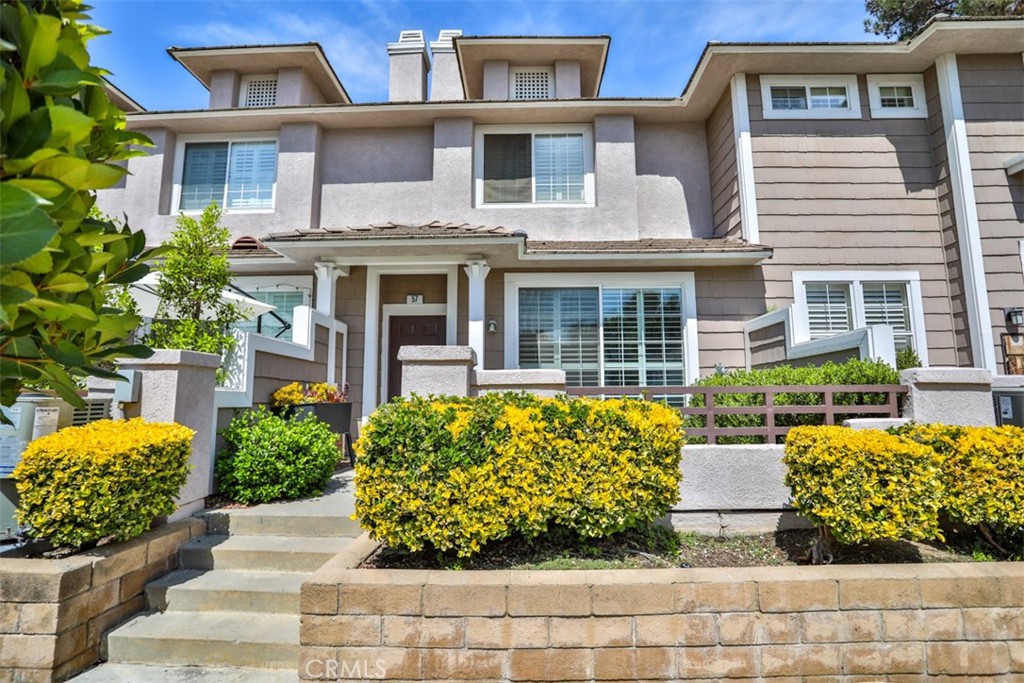 a front view of a multi story residential apartment building