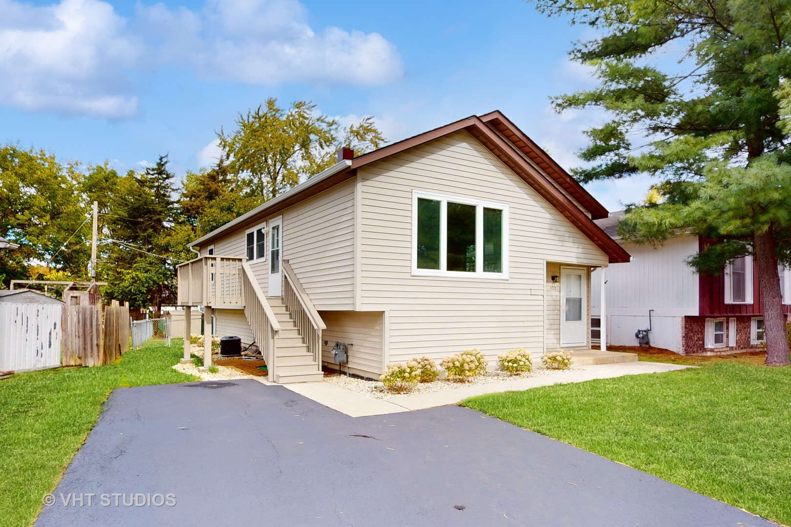 a view of a yard in front of house