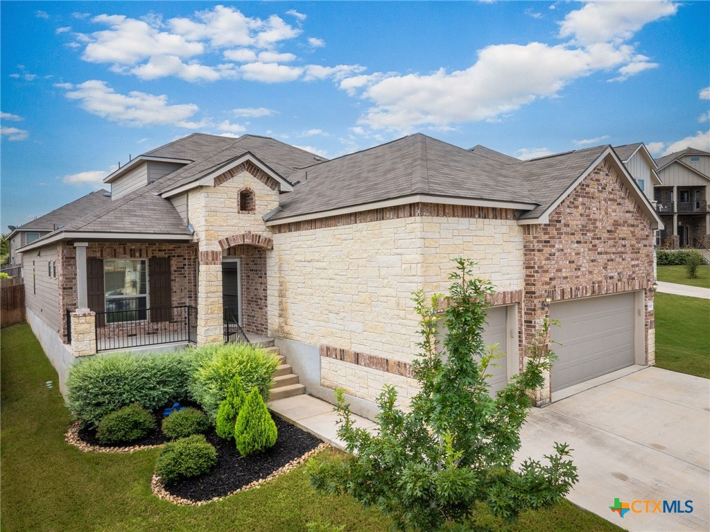 front view of a house with a yard