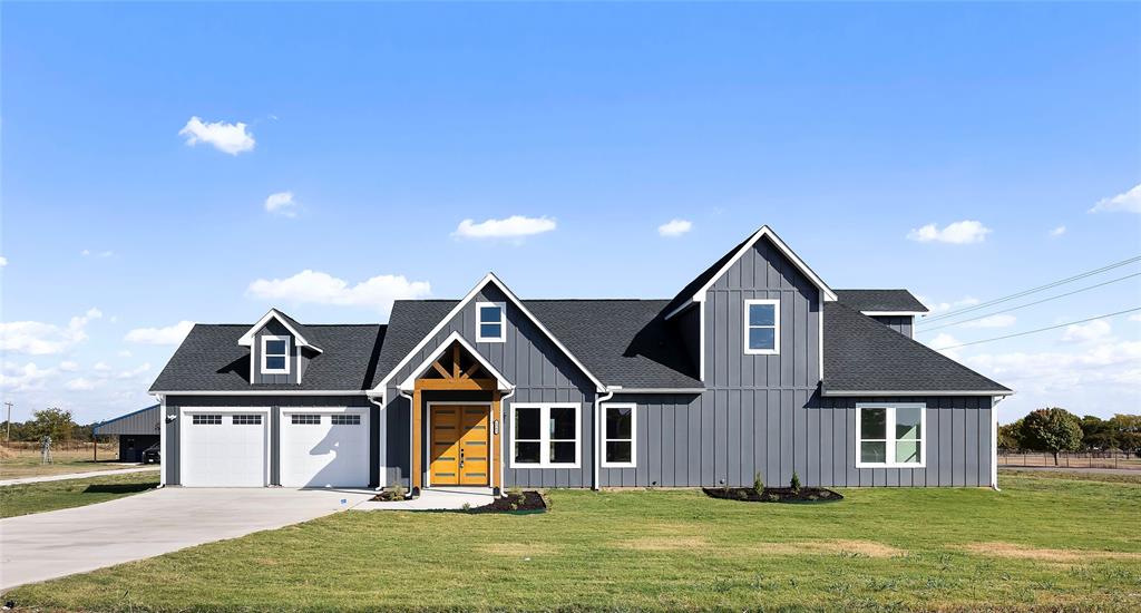 front view of house with a yard