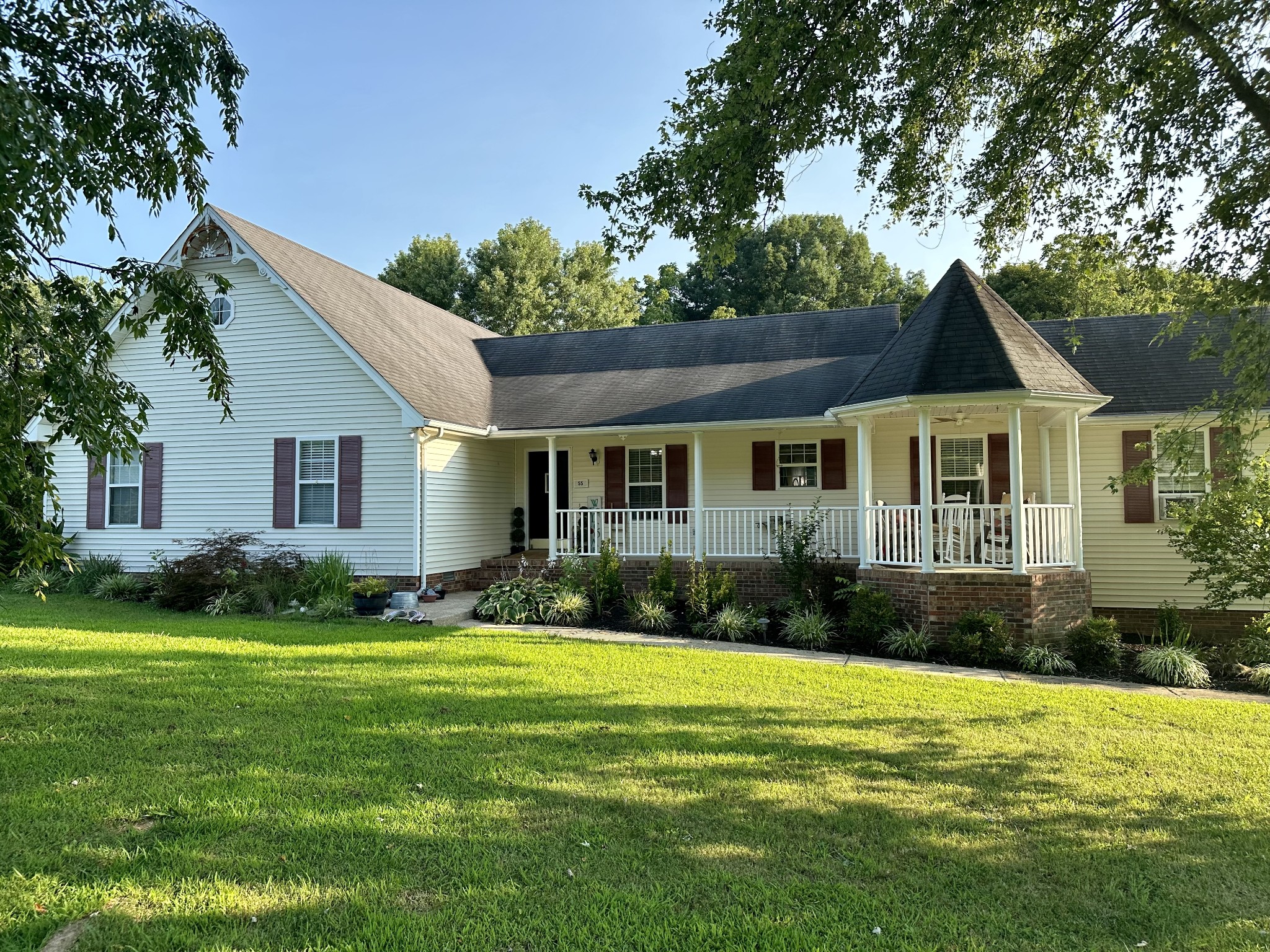 a front view of a house with a yard