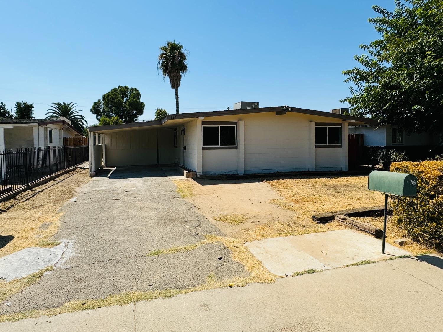 a view of a backyard of the house