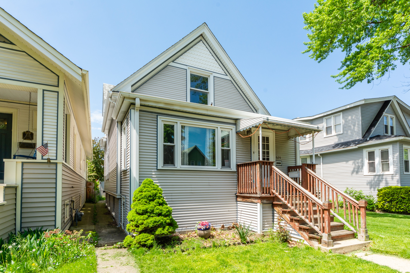 front view of a house with a yard