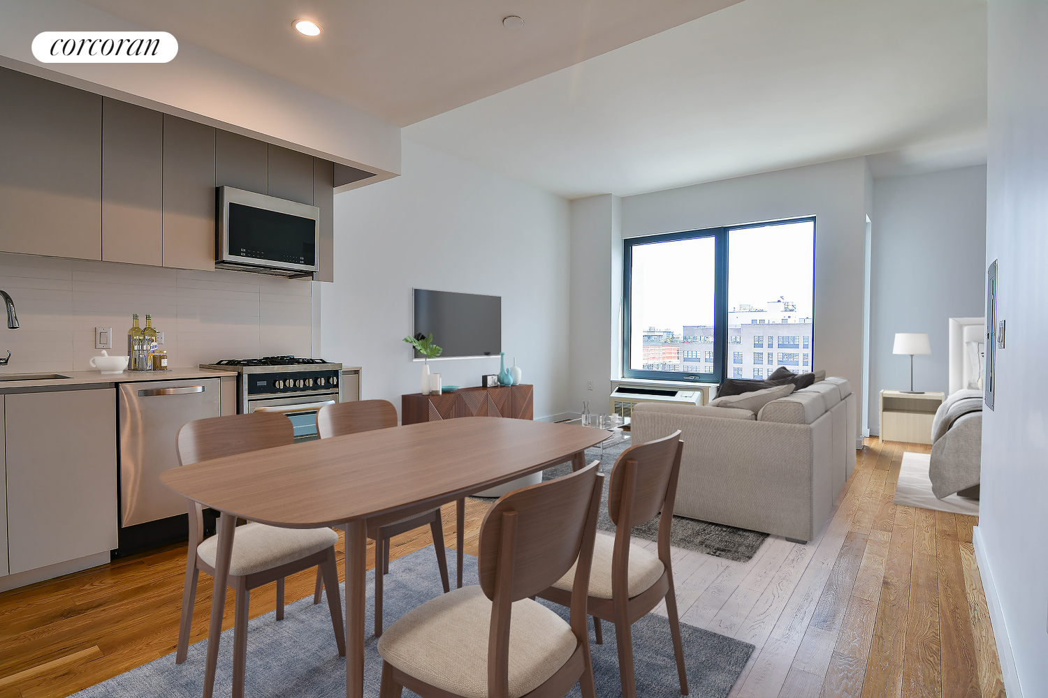 a dining room with furniture and wooden floor