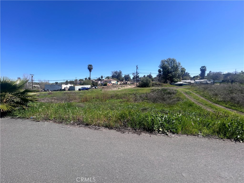 a view of a road with a building in the background