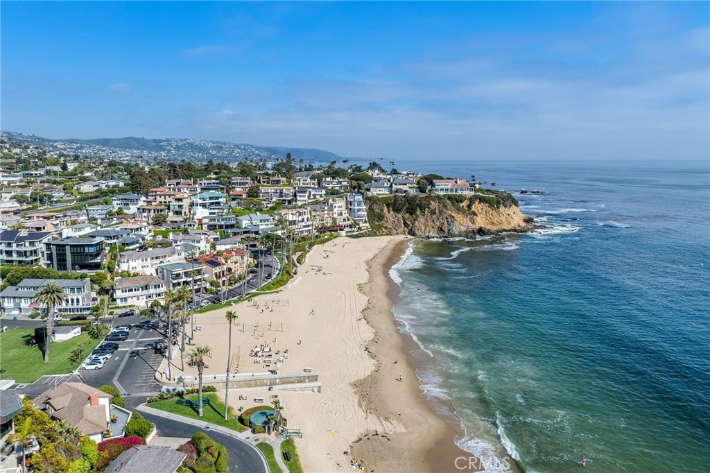 an aerial view of a house with a ocean view