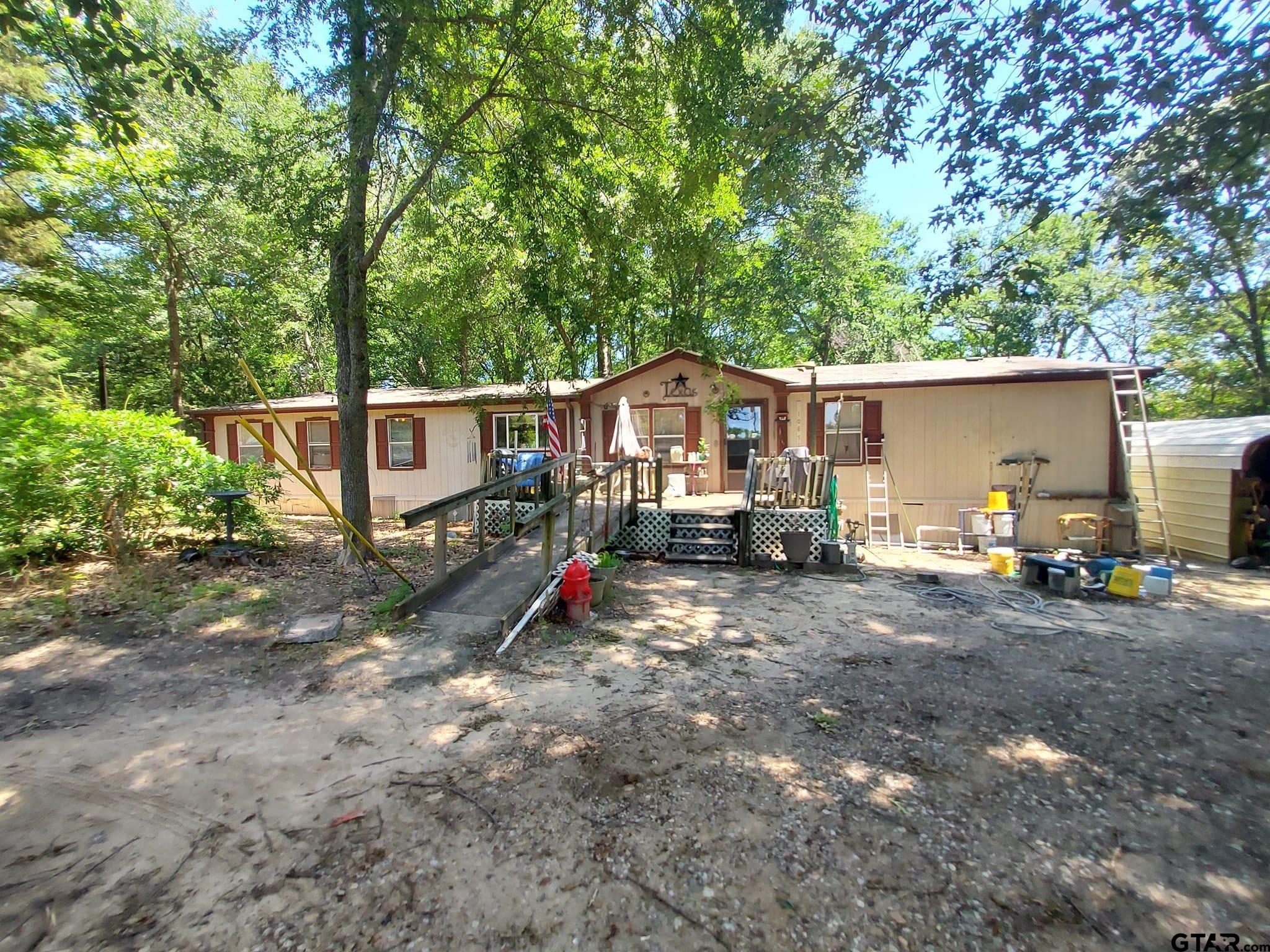 a view of house with a outdoor space