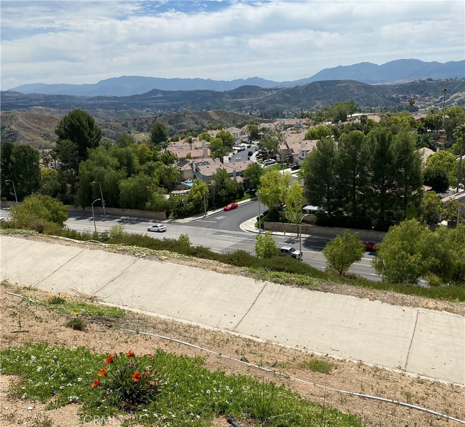 a view of a street with a mountain view