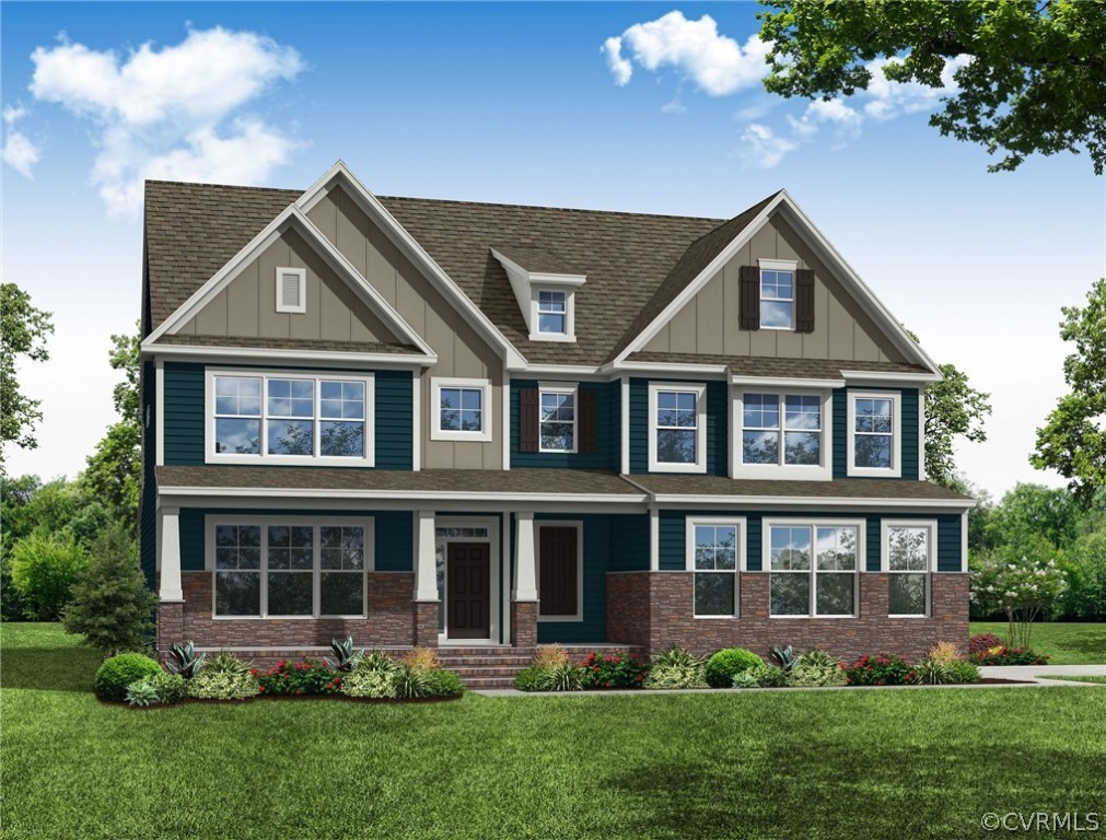 a front view of a house with a yard and porch