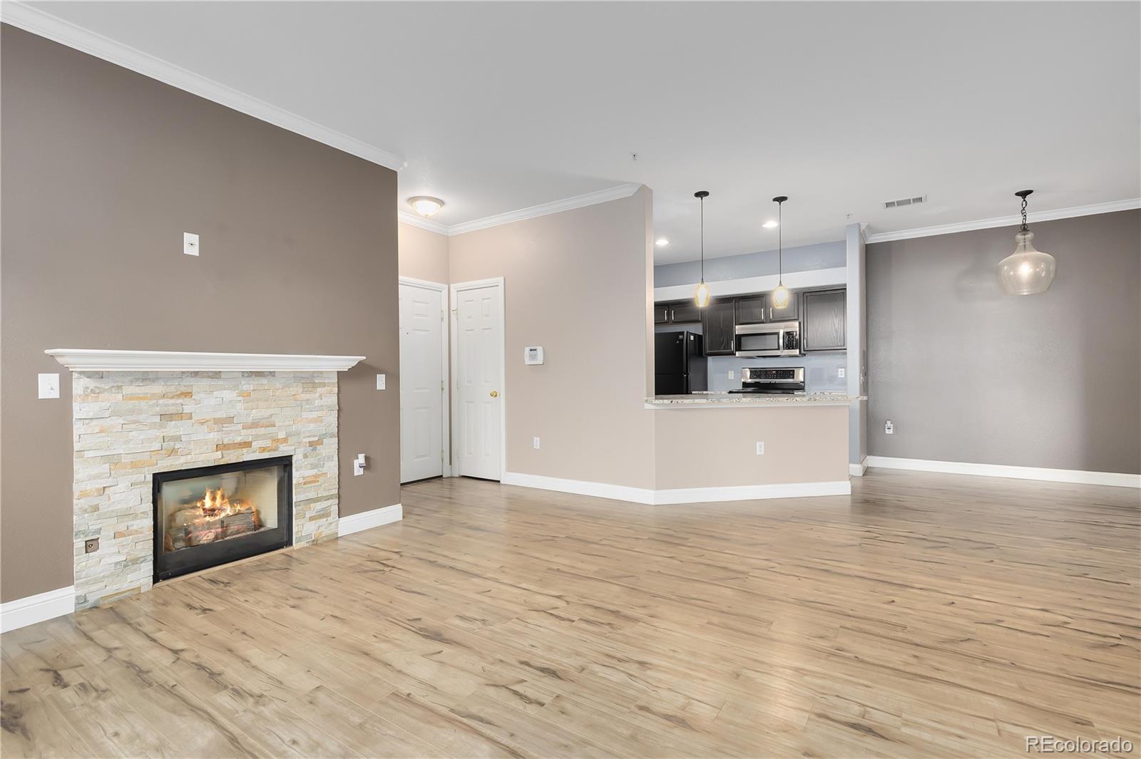 a view of a livingroom with a fireplace