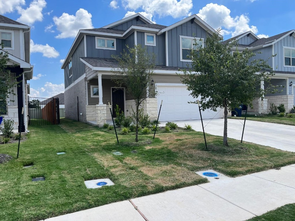 a house view with a garden space