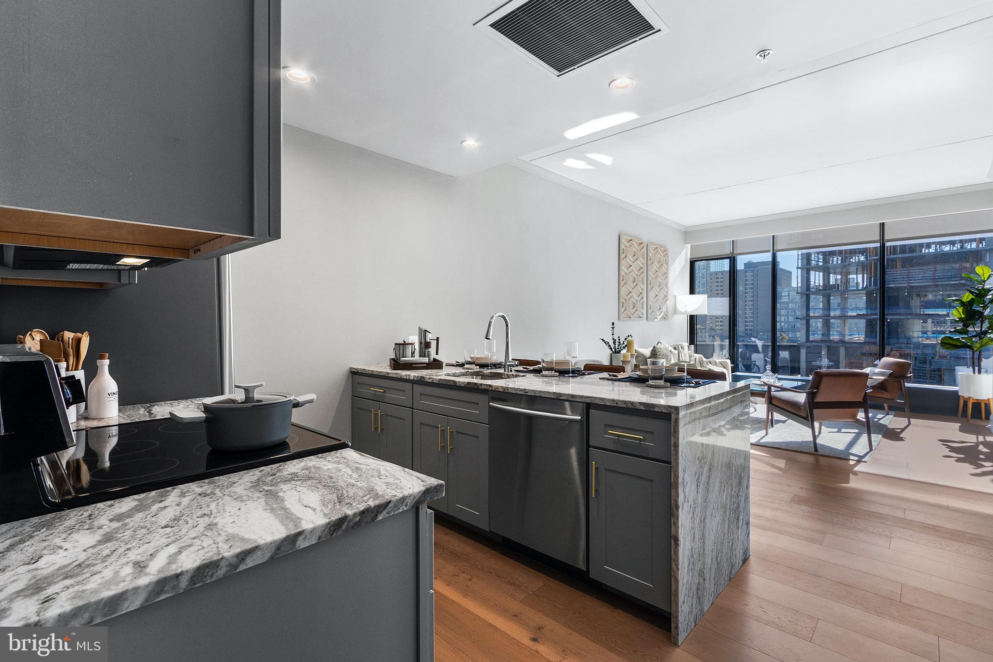 a kitchen with a sink and stove