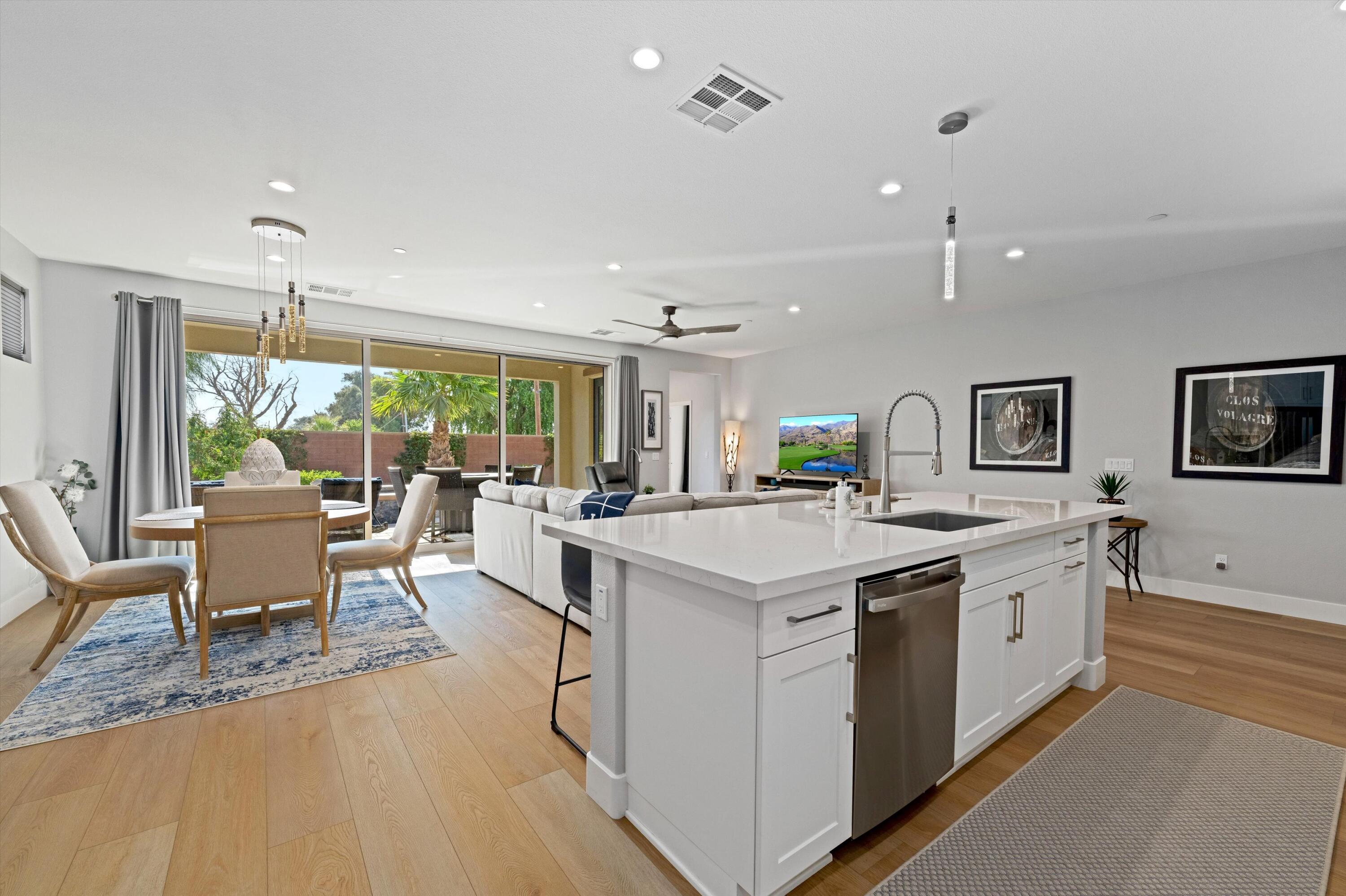 a kitchen with a stove and a refrigerator