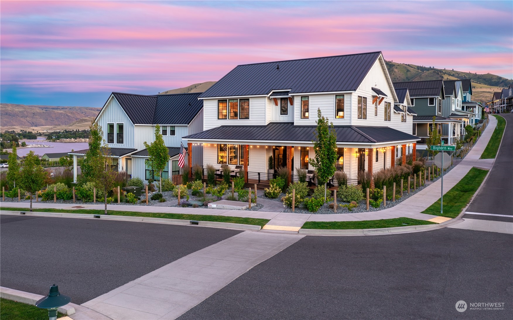 a front view of a house next to a yard