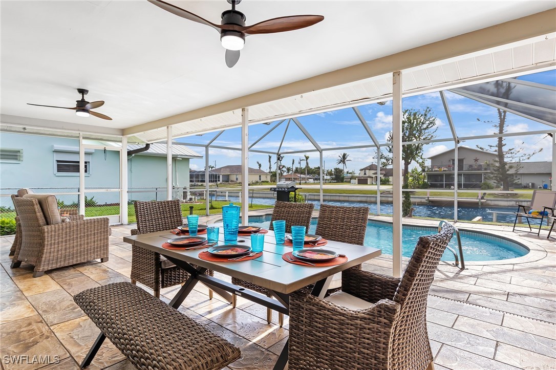 a outdoor space with patio the couches and pool table