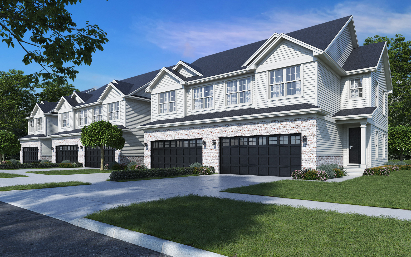 a front view of a house with a garden and garage