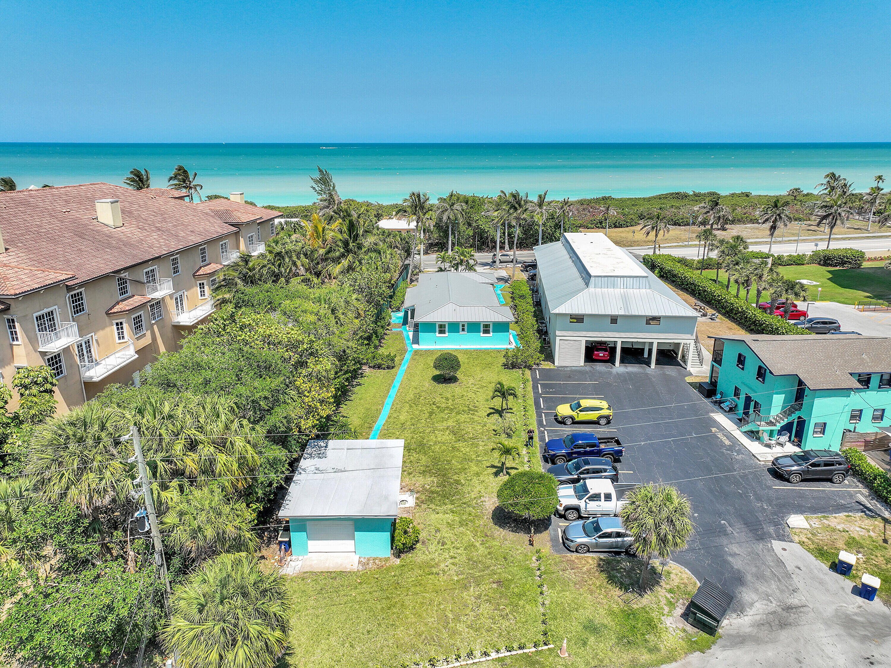 an aerial view of a house with a garden