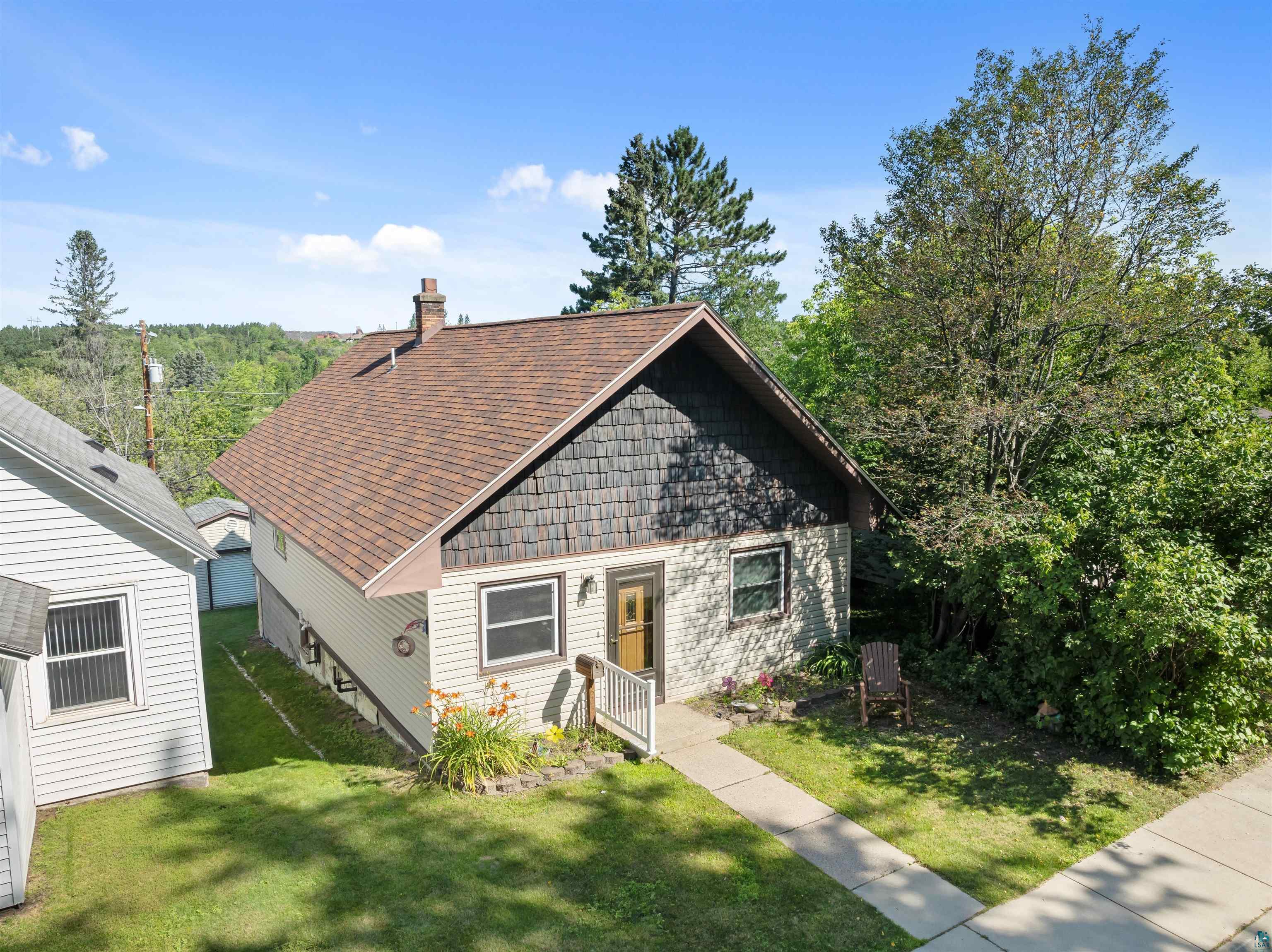 View of front of house with a front lawn