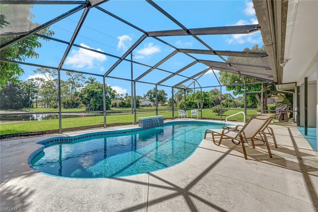 a view of a swimming pool with a porch