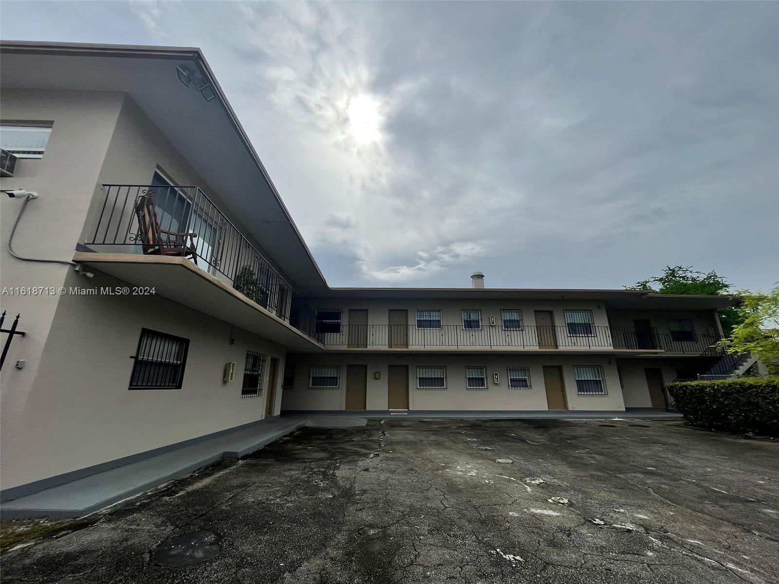 a view of a house with roof deck