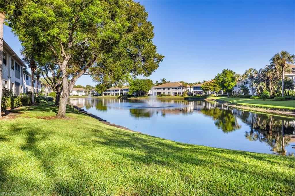 Water view overlooking lake with beautiful fountain.