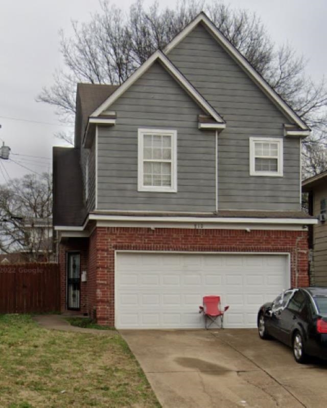 a view of a house with a garage