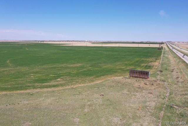 a view of a field with an empty space