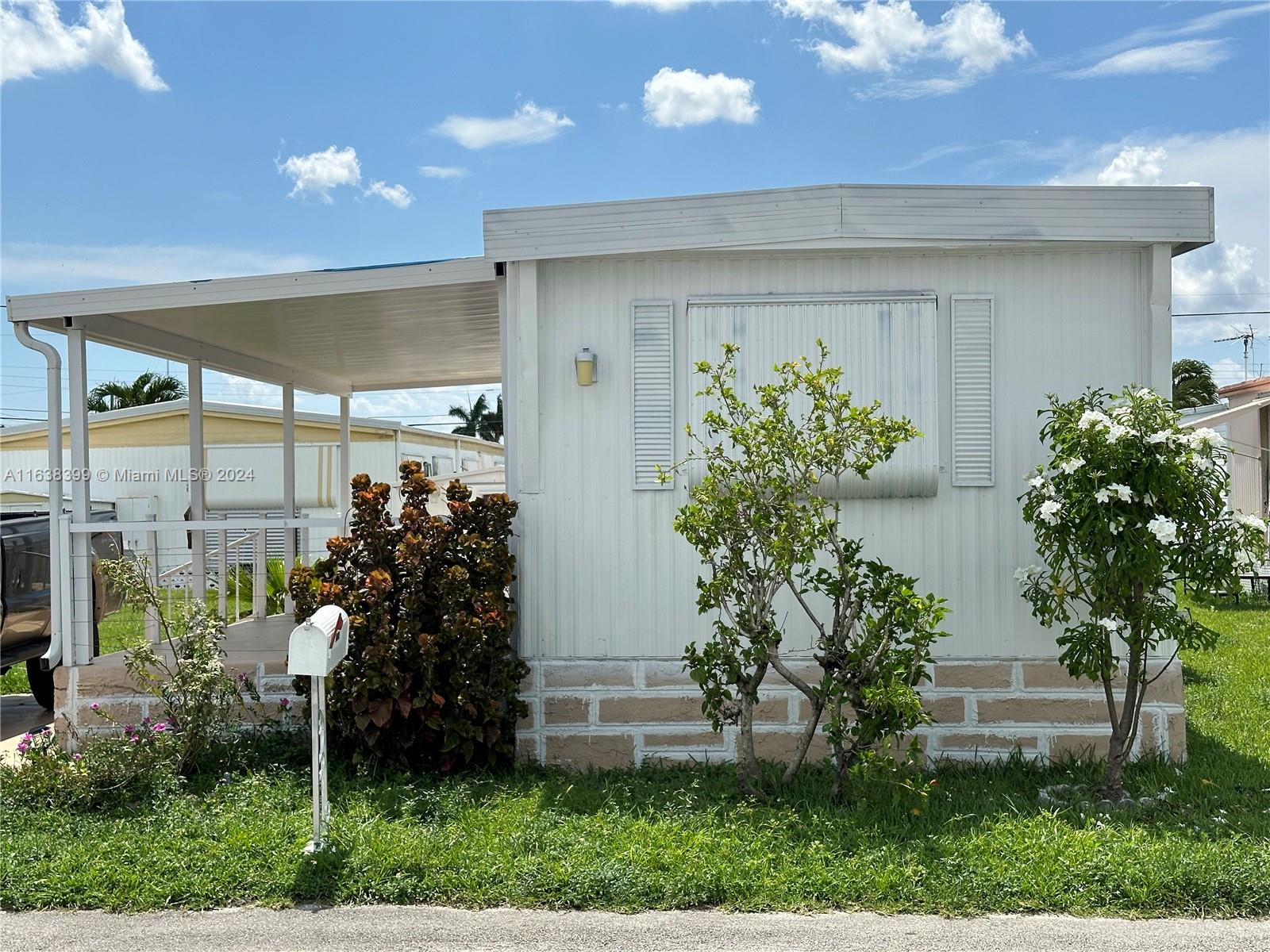 a front view of a house with a porch