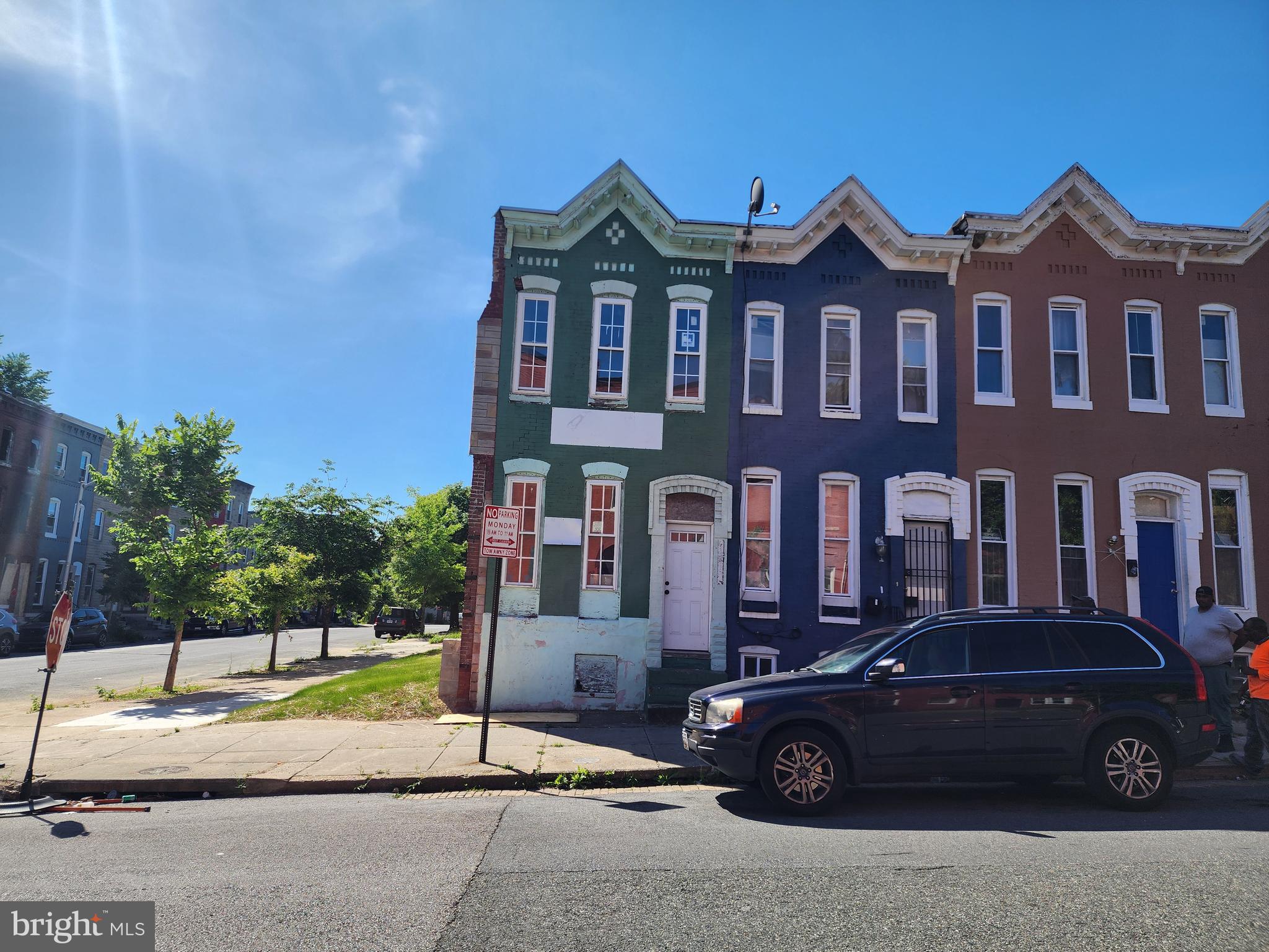 a car parked in front of a house