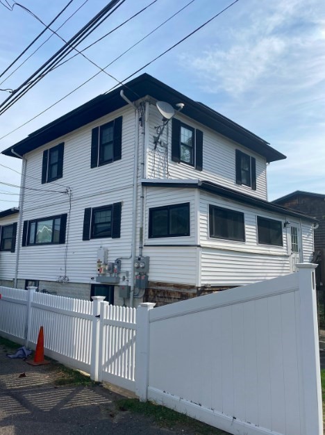 a front view of a house with a garage