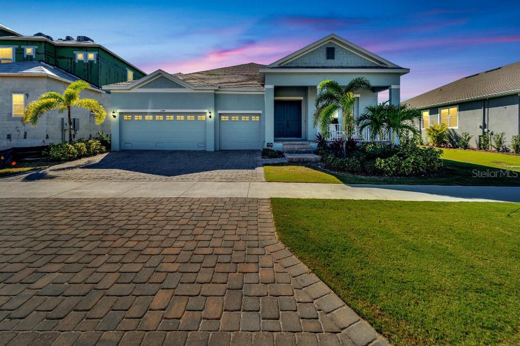 a front view of a house with swimming pool