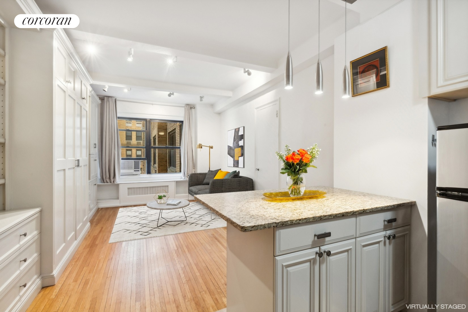 a view of kitchen island wooden floor