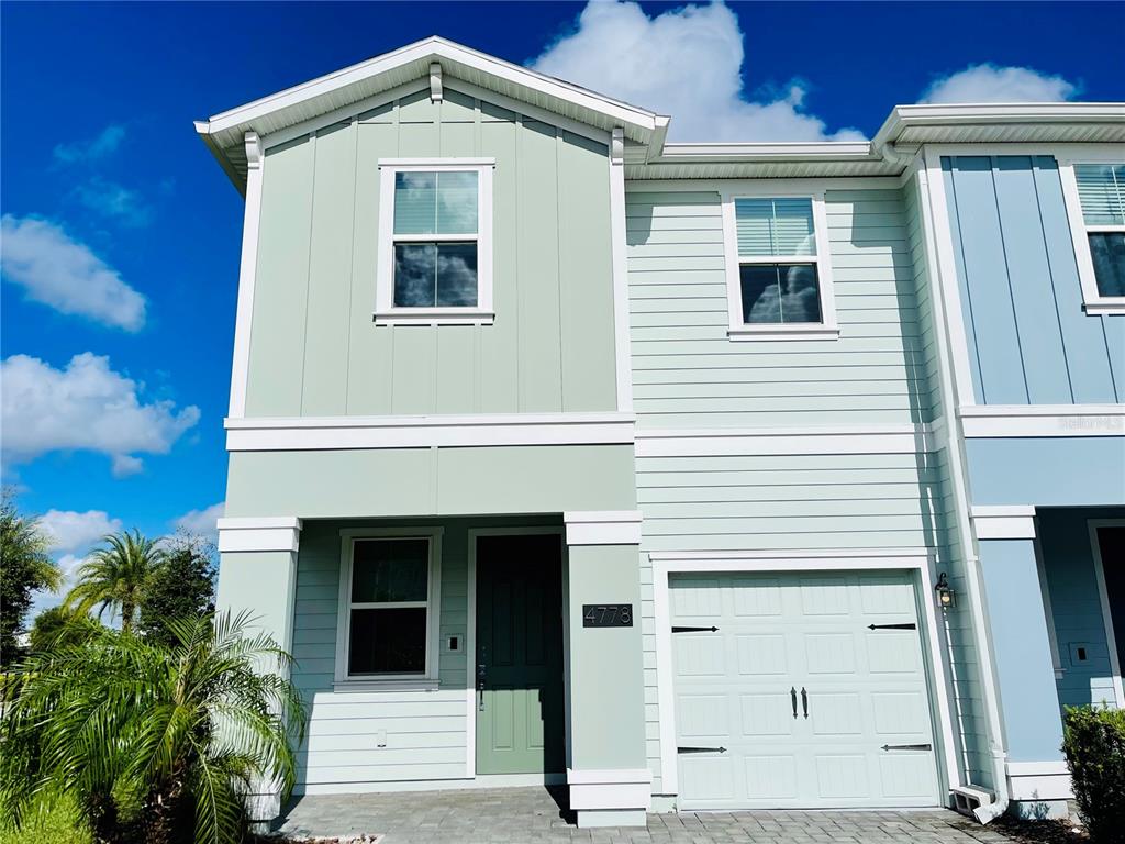 a front view of a house with a balcony