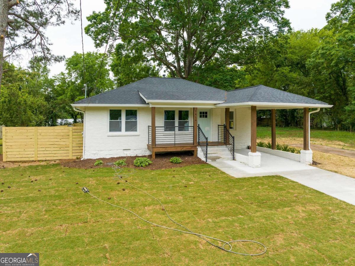 a view of a house with a swimming pool