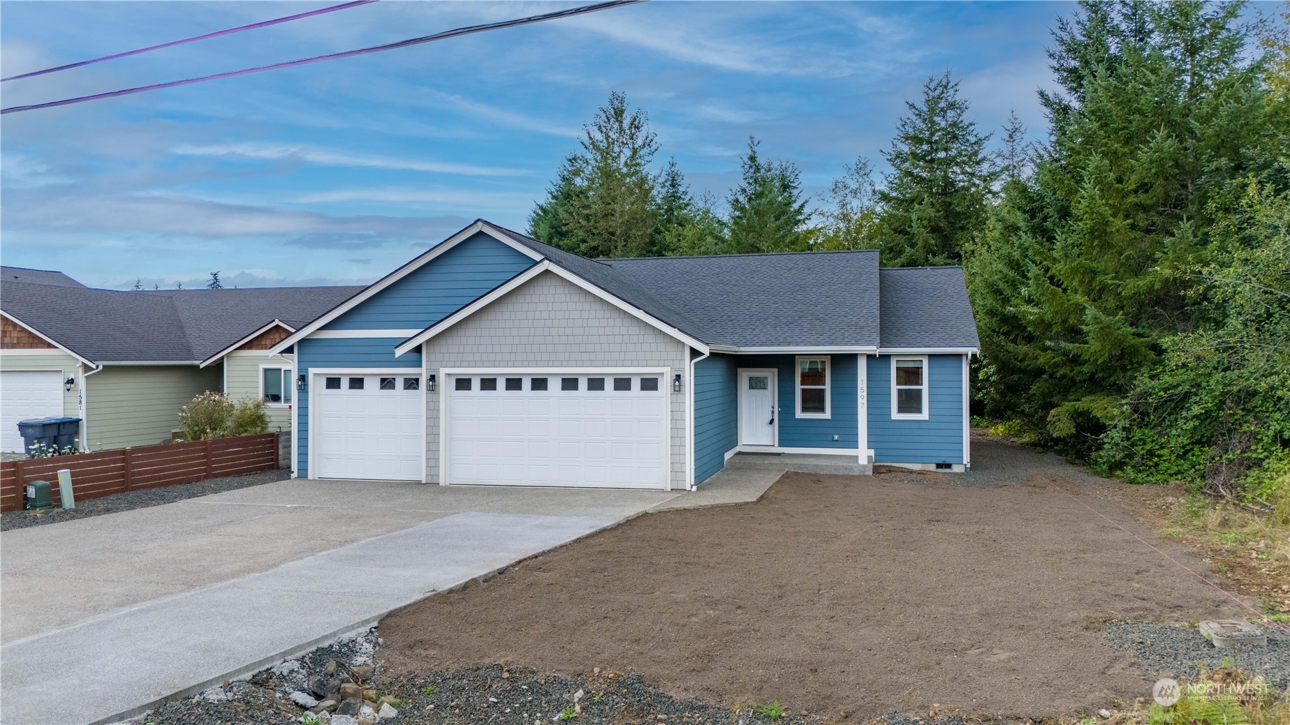 front view of a house with a yard