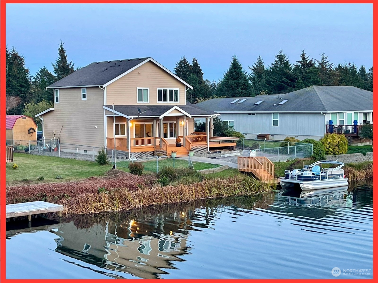 a front view of house with yard and outdoor seating