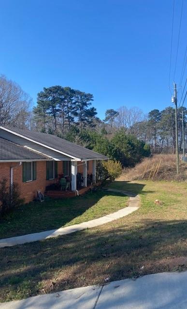 a view of a house with a big yard