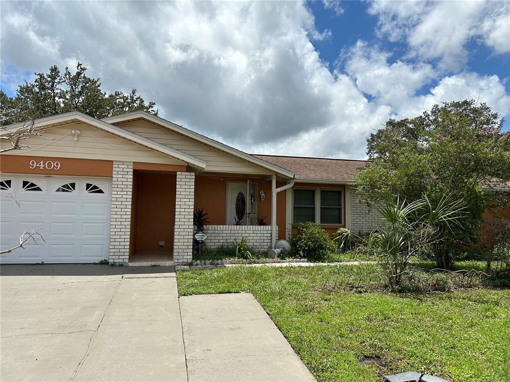 a front view of house with yard