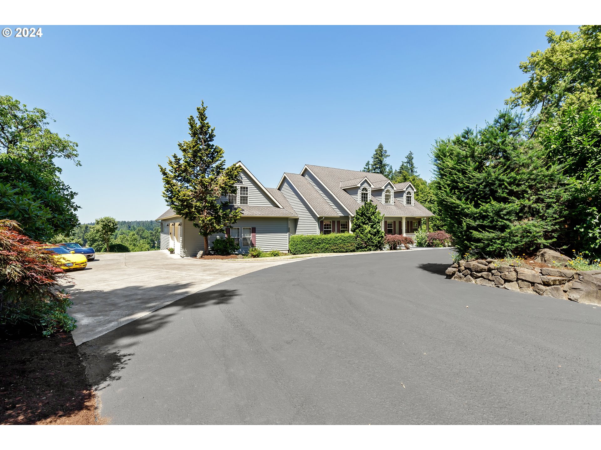 a house with a yard and parking space