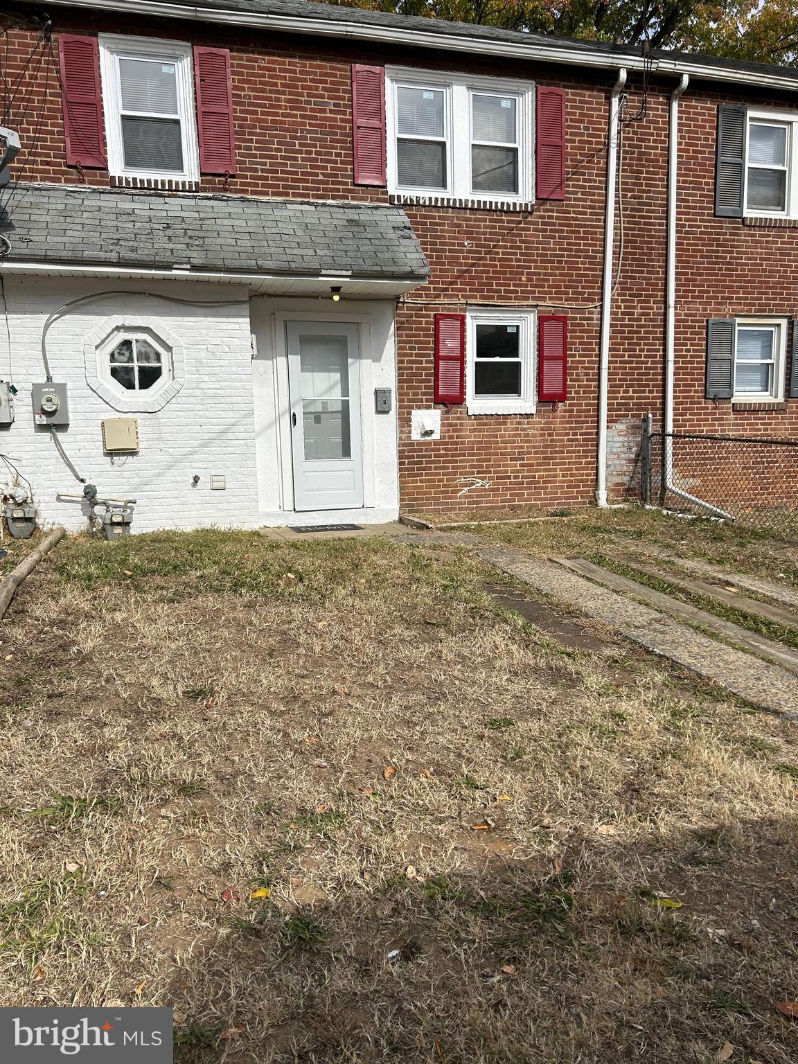 a front view of a house with a garage