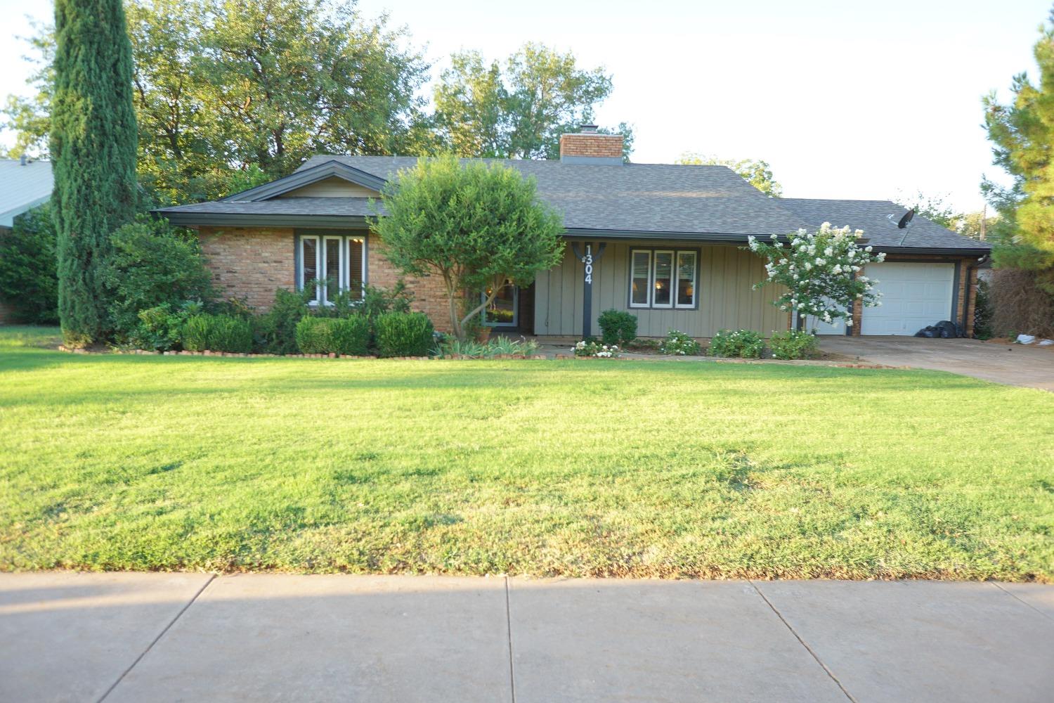 a view of a house with a swimming pool