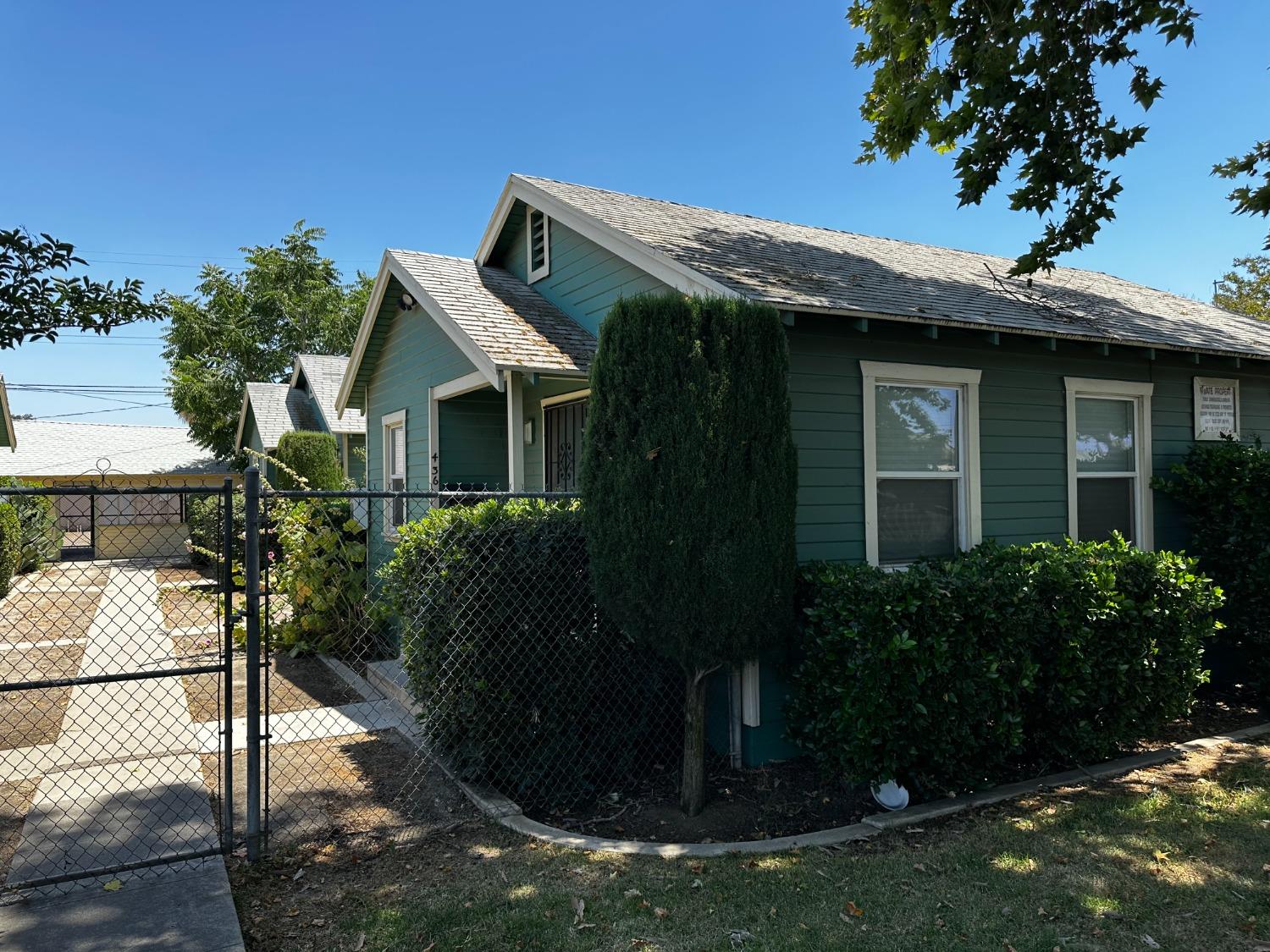 a house with trees in the background