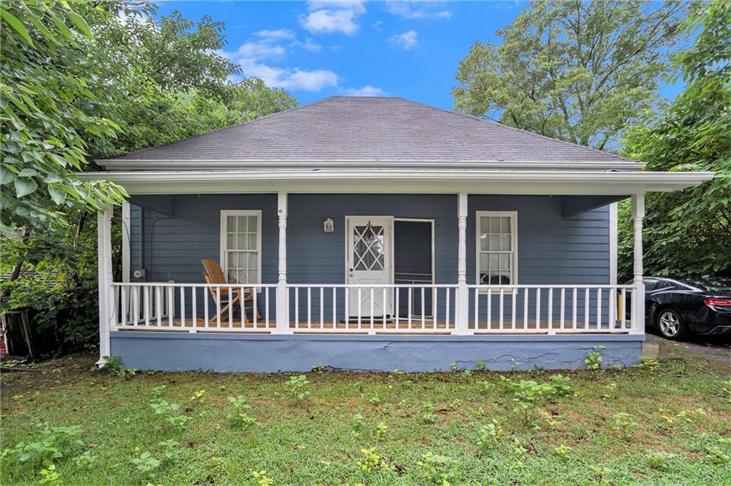 a view of a house with a roof deck