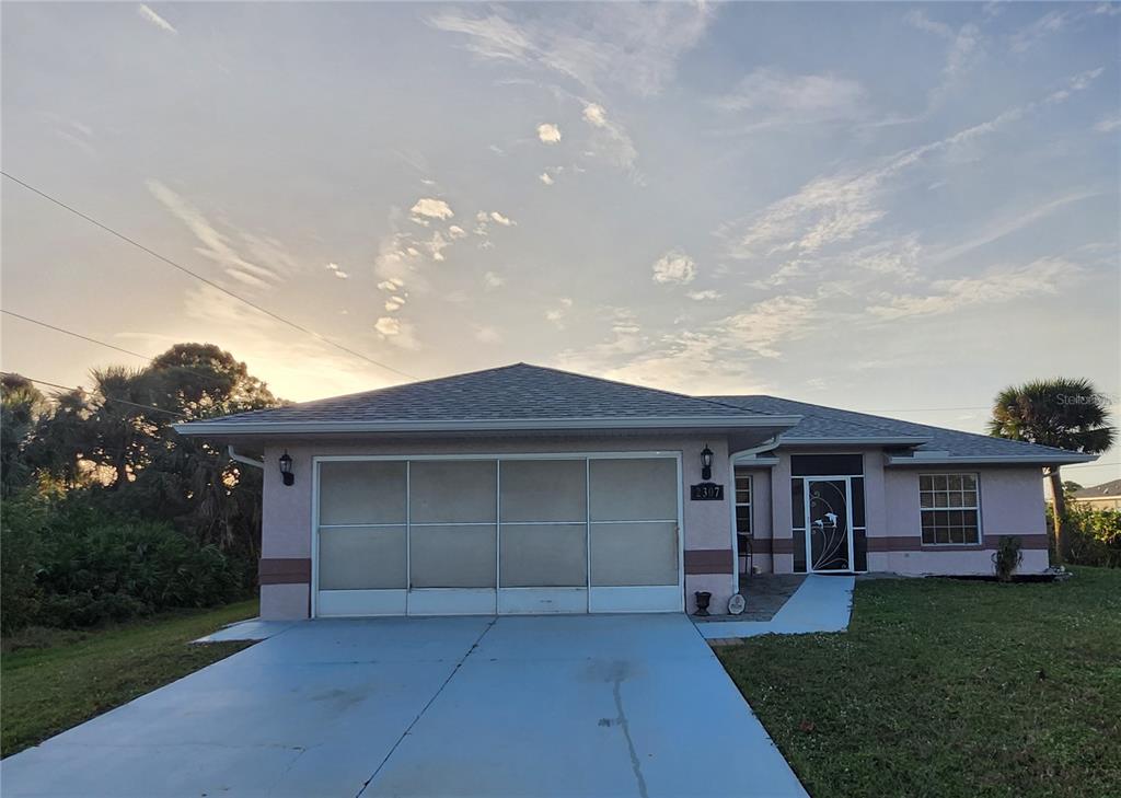 front view of a house with a yard