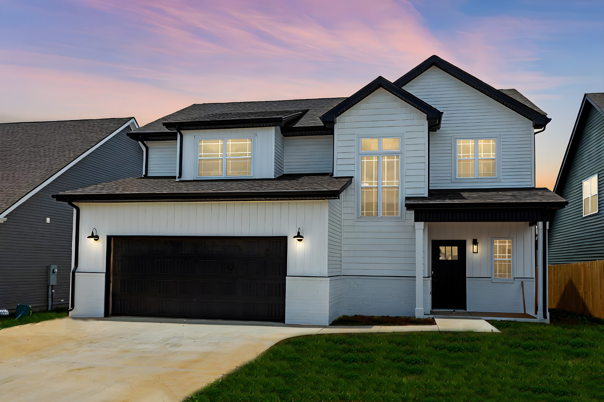 a front view of a house with a yard