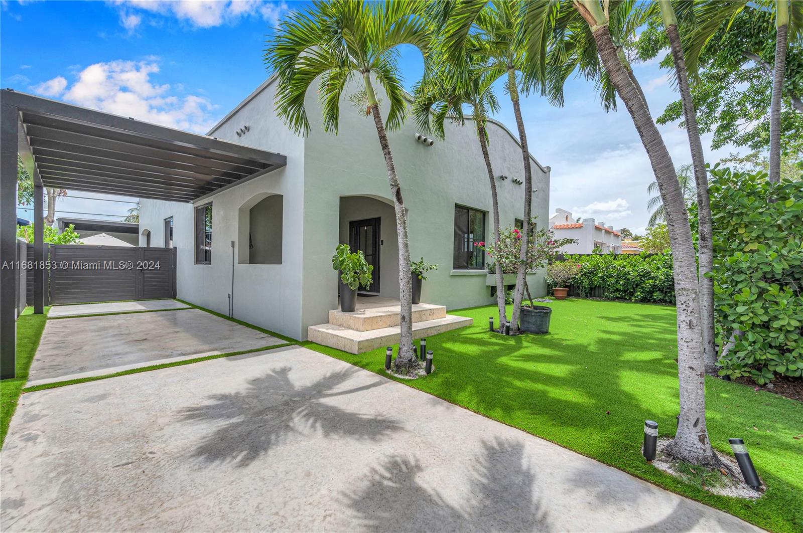 a view of a backyard and porch