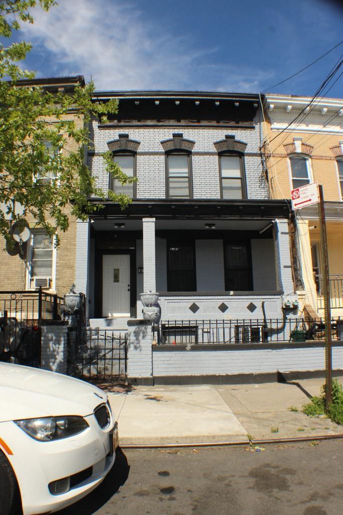 View of front of property with covered porch