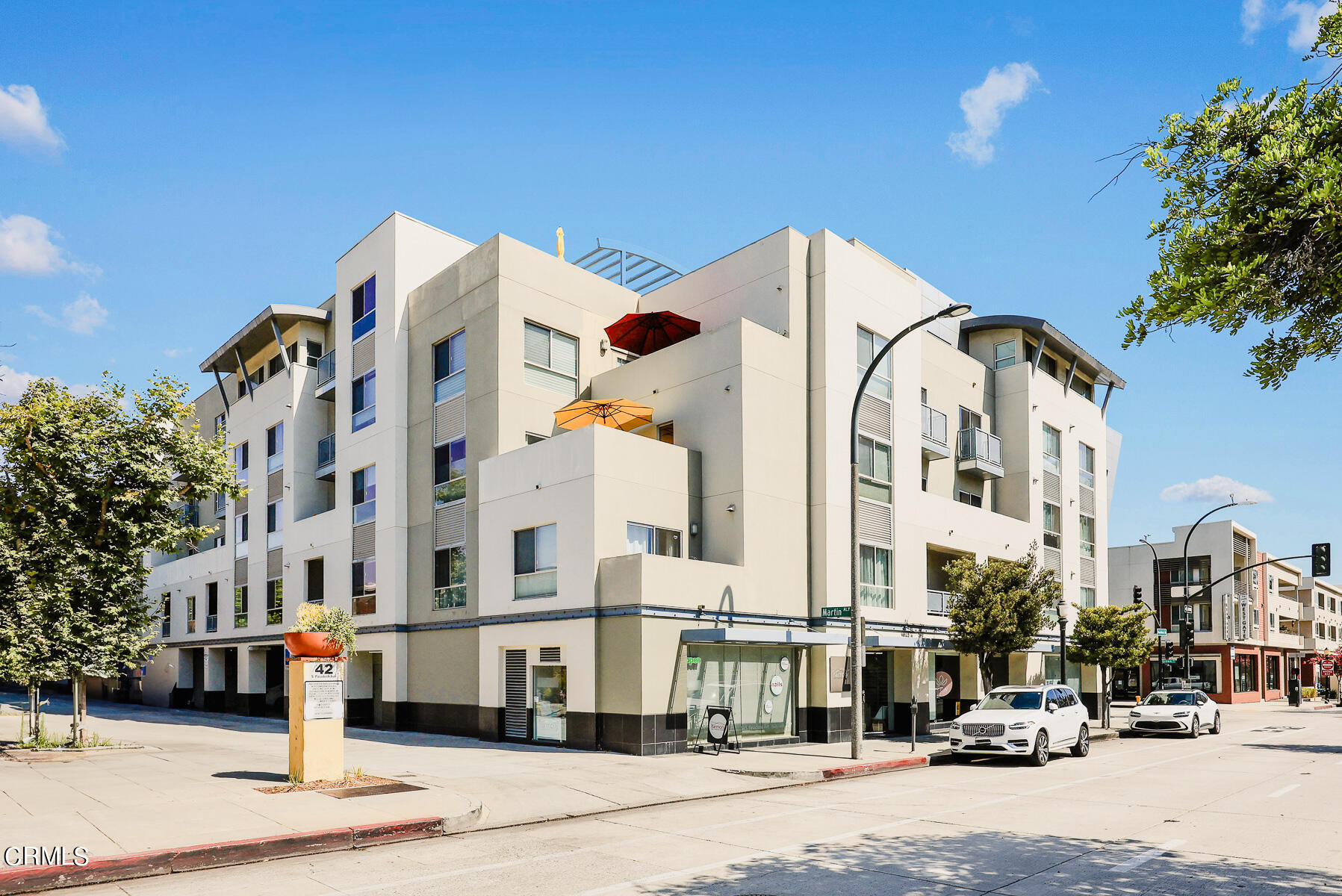 a front view of a building with street view