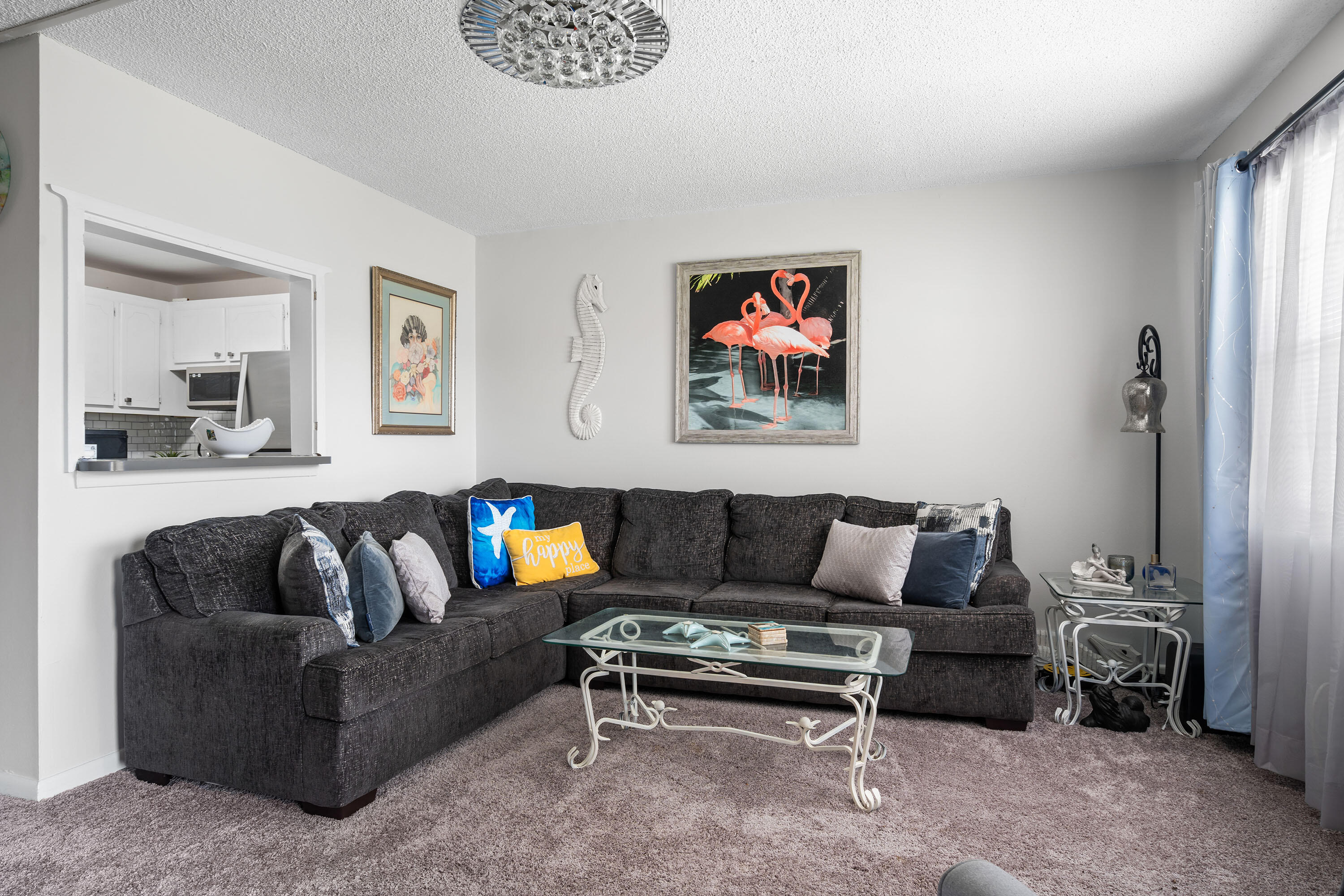 a living room with furniture and a couch