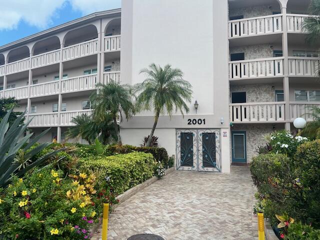 a front view of multi story residential apartment building